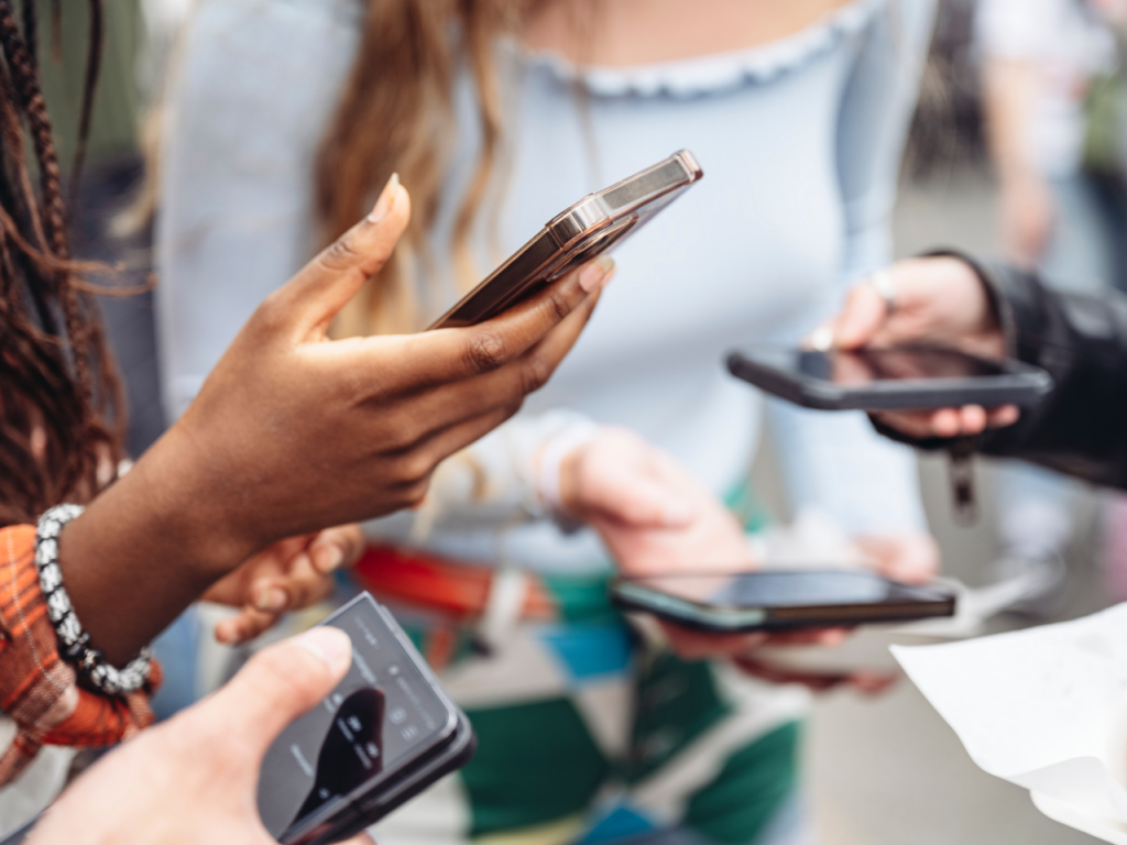 group of people on their phones